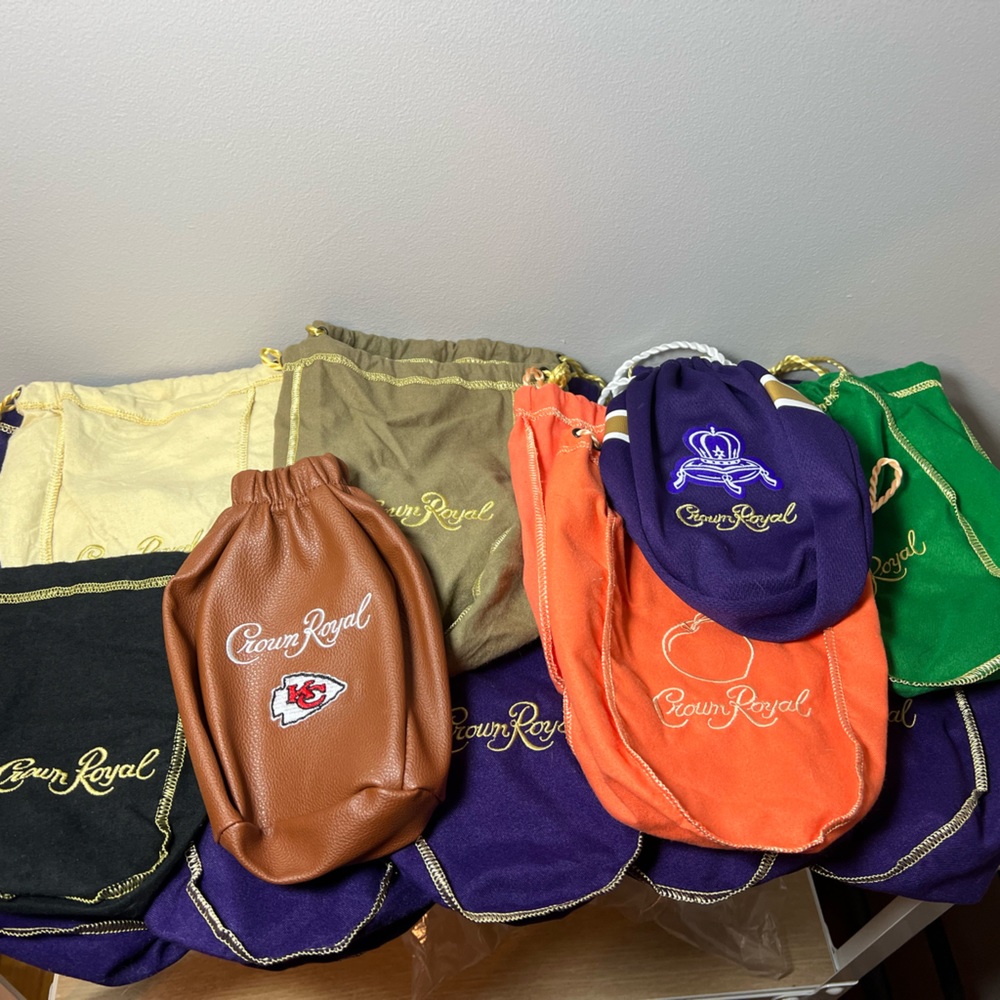 CROWN ROYAL bags -22 total- KC CHEIFS, VIKINGS, ORIGINAL PEACH AND APPLE BAGS